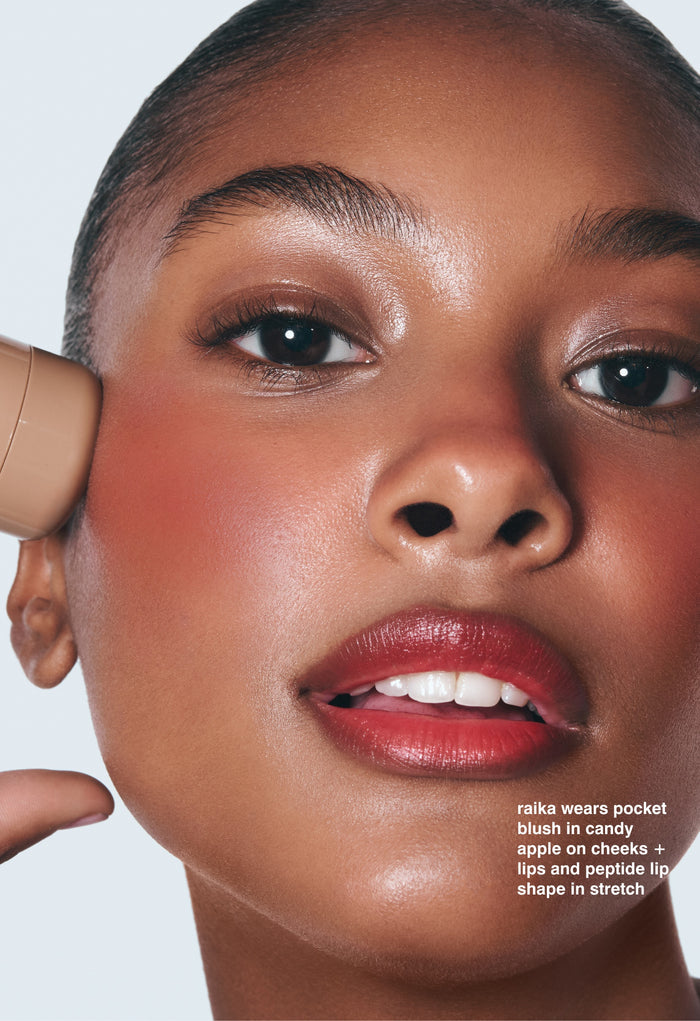 raika wears pocket blush in candy apple on cheeks + lips and peptide lip shape in stretch