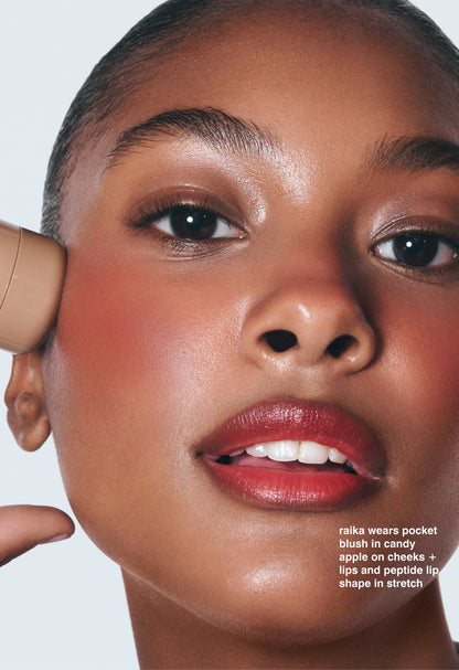 raika wears pocket blush in candy apple on cheeks + lips and peptide lip shape in stretch