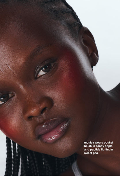 monica wears pocket blush in candy apple and peptide lip tint in sweet pea