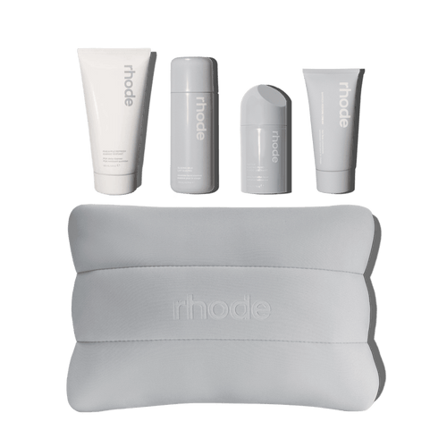 The rhode kit includes Pineapple Refresh, Glazing Milk, Peptide Glazing Fluid, Barrier Restore Cream bundled up in a rhode bubble bag.