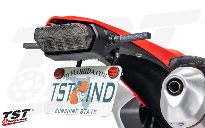 Removes the oversized stock fender.