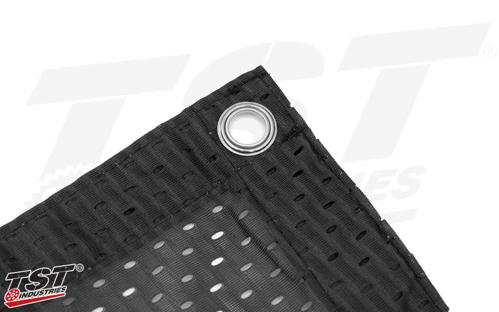 Steel grommets provide sturdy anchoring points.