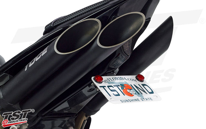 High mounting places your license plate in a position similar to stock.