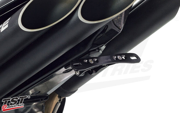 CNC machined aluminum components feature a black anodized finish.