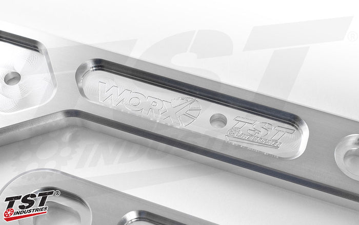 Engraved TST Industries and WORX iconography.