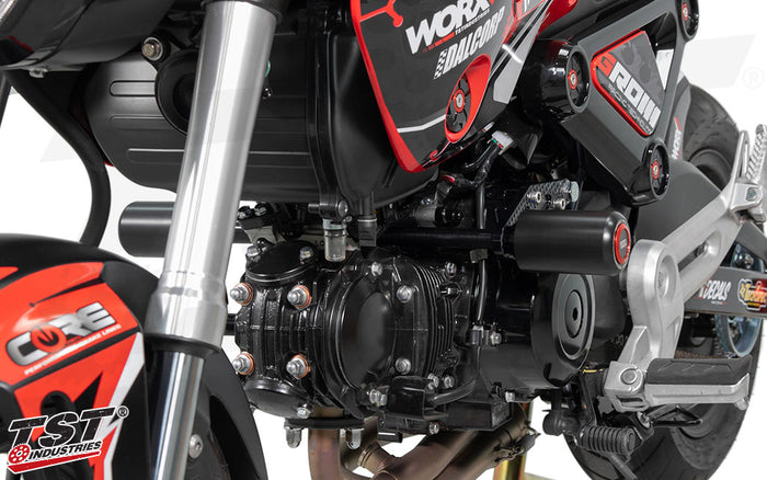 Robust delrin sliders and rigid cross-member brackets provide cage-like protection.