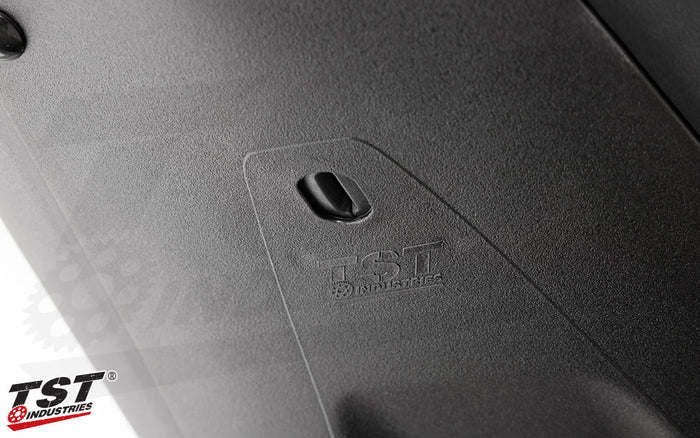 Spring-Loaded actuating lock cover keeps the undertail seat lock protected yet accessible.
