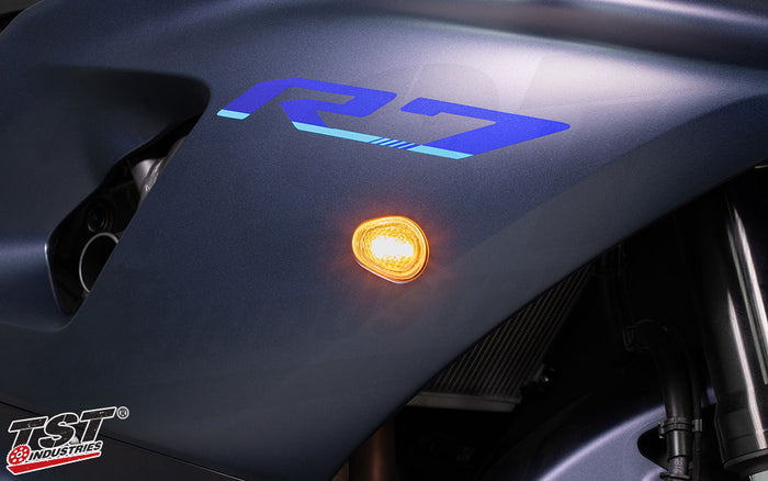 Bright amber LEDs activate during turn signal indication.