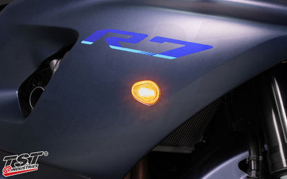 Bright amber LEDs activate during turn signal indication.