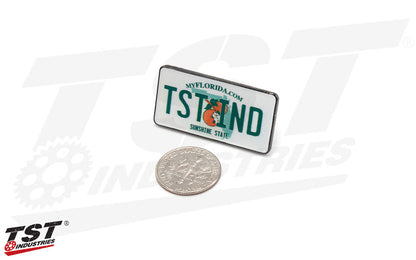 1⅜" wide by ⅝" tall - Dime not included.