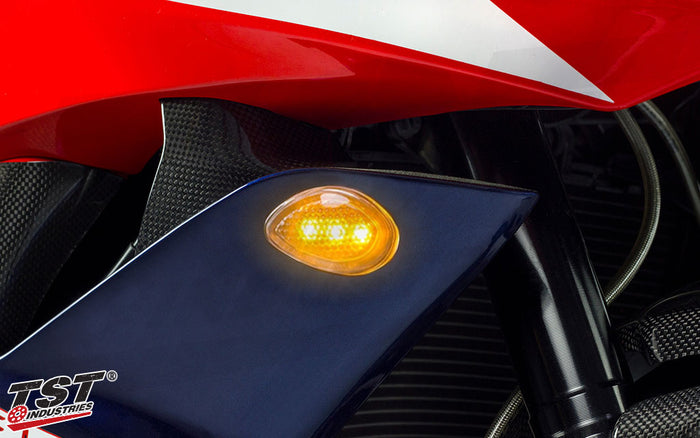 Features bright amber LEDs that activate for signaling.