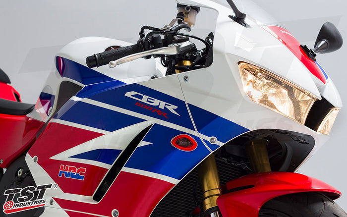 TST LED HALO-1 Flushmount Front Turn Signal with Red running light on the 2013+ Honda CBR600RR.