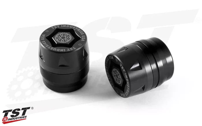 Anodized Black Rear Axle Sliders from TST Industries.