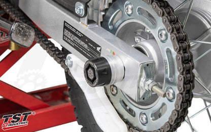 Protect your Honda XR150L with TST Industries Rear Axle Sliders.