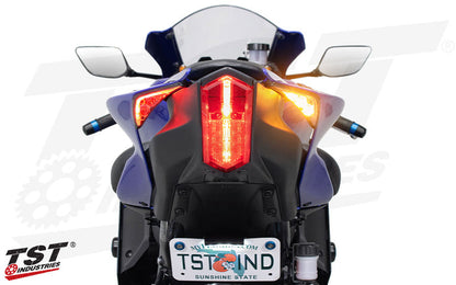 Red and amber LEDs feature running (rear DRL), brake, and turn signal functions.