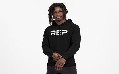 The REP Fitness Unisex Daily Driver 2.0 Pull Over Hoodie in Black/White front, on model