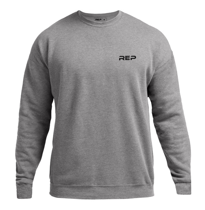 The REP Fitness Unisex REP® Crewneck Sweatshirt in Heather Gray/Black front