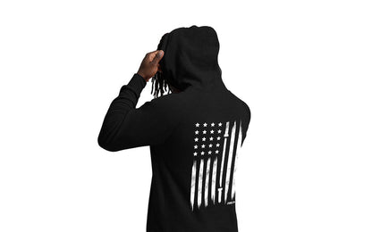 The REP Fitness Unisex USA Pull Over Hoodie in Black/White back, reaching for hood