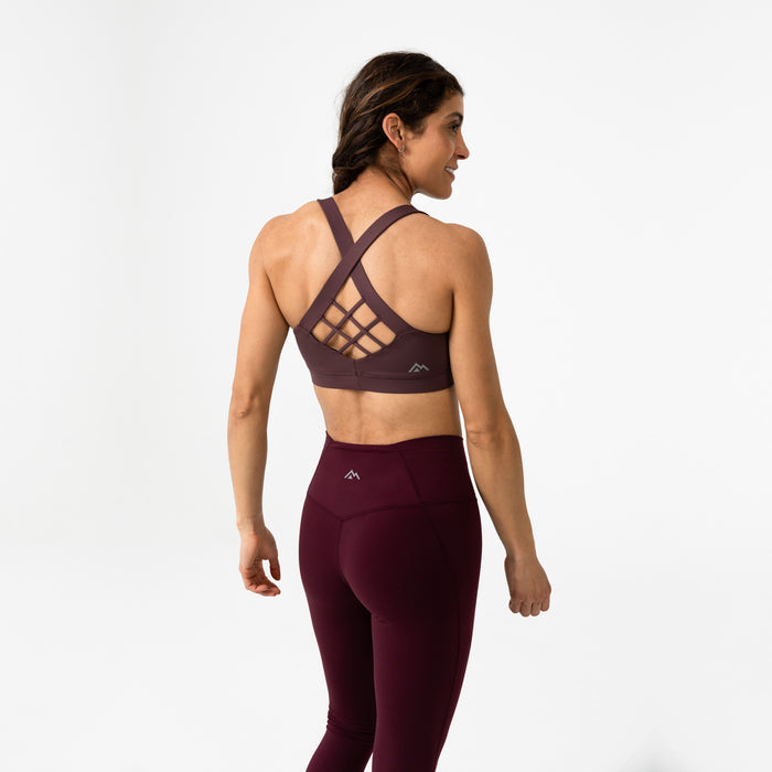 The REP Fitness Women's Lattis Sports Bra in Cocoa Powder back, posing