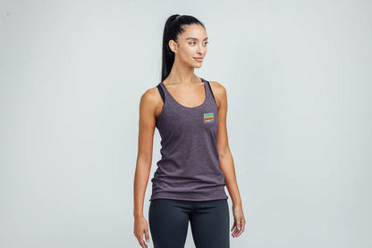 The REP Fitness Women's Rise Tri-Blend Tank in Heather Purple/Blue on body