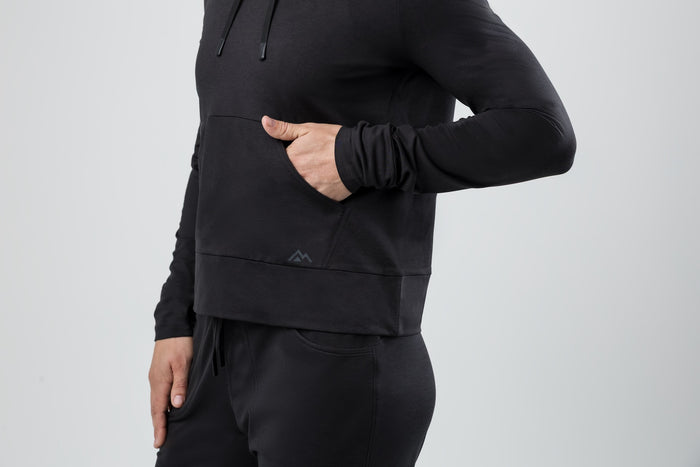The REP Fitness Women's Vellus Hoodie in Heather Black front, pocket detail