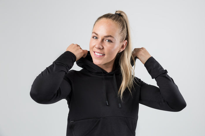 The REP Fitness Women's Vellus Hoodie in Heather Black front, upper body
