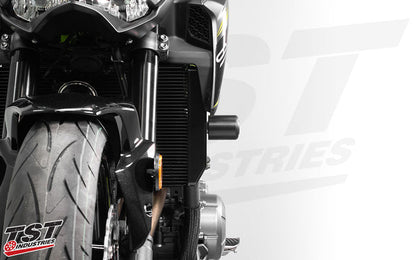 Robust delrin sliders provide initial impact absorption as well as a consumable sliding surface.