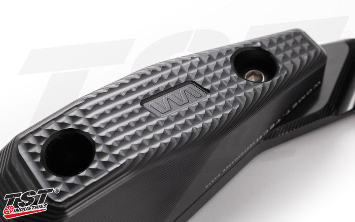 Delrin pucks provide initial impact absorption and a consumable sliding surface.