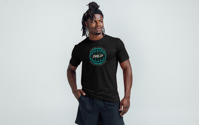 Athlete wearing the REP Fitness Worldwide Tri-Blend Crew T-Shirt in Heather Black with a blue graphic