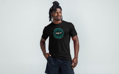 Athlete wearing the REP Fitness Worldwide Tri-Blend Crew T-Shirt in Heather Black with a blue graphic